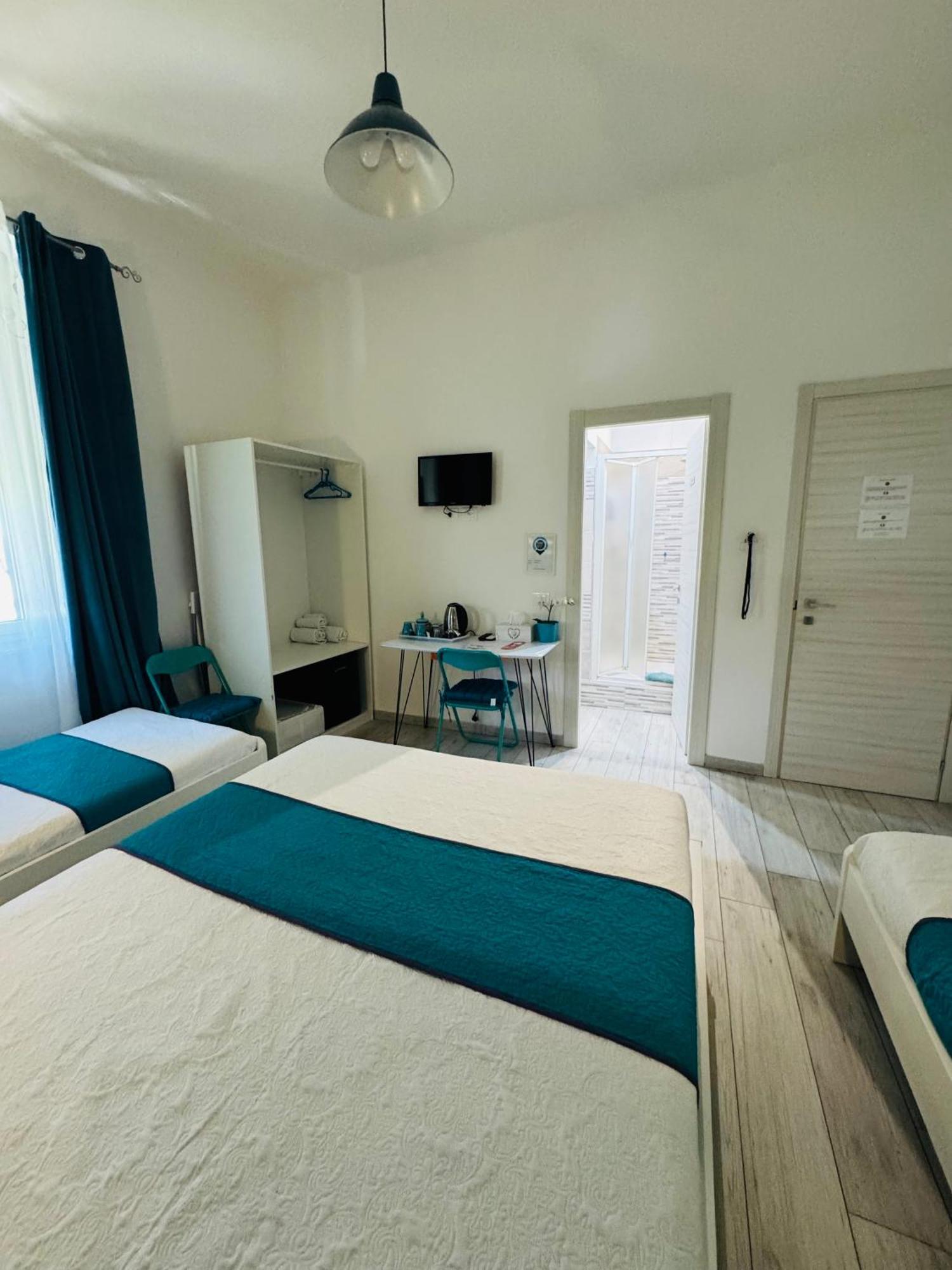 Chambre Triple - Vue sur Ville
