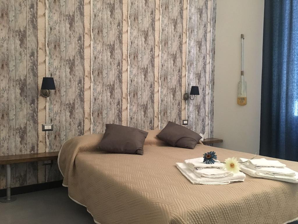 Chambre Double avec Lit d'Appoint (2 Adultes + 1 Enfant)